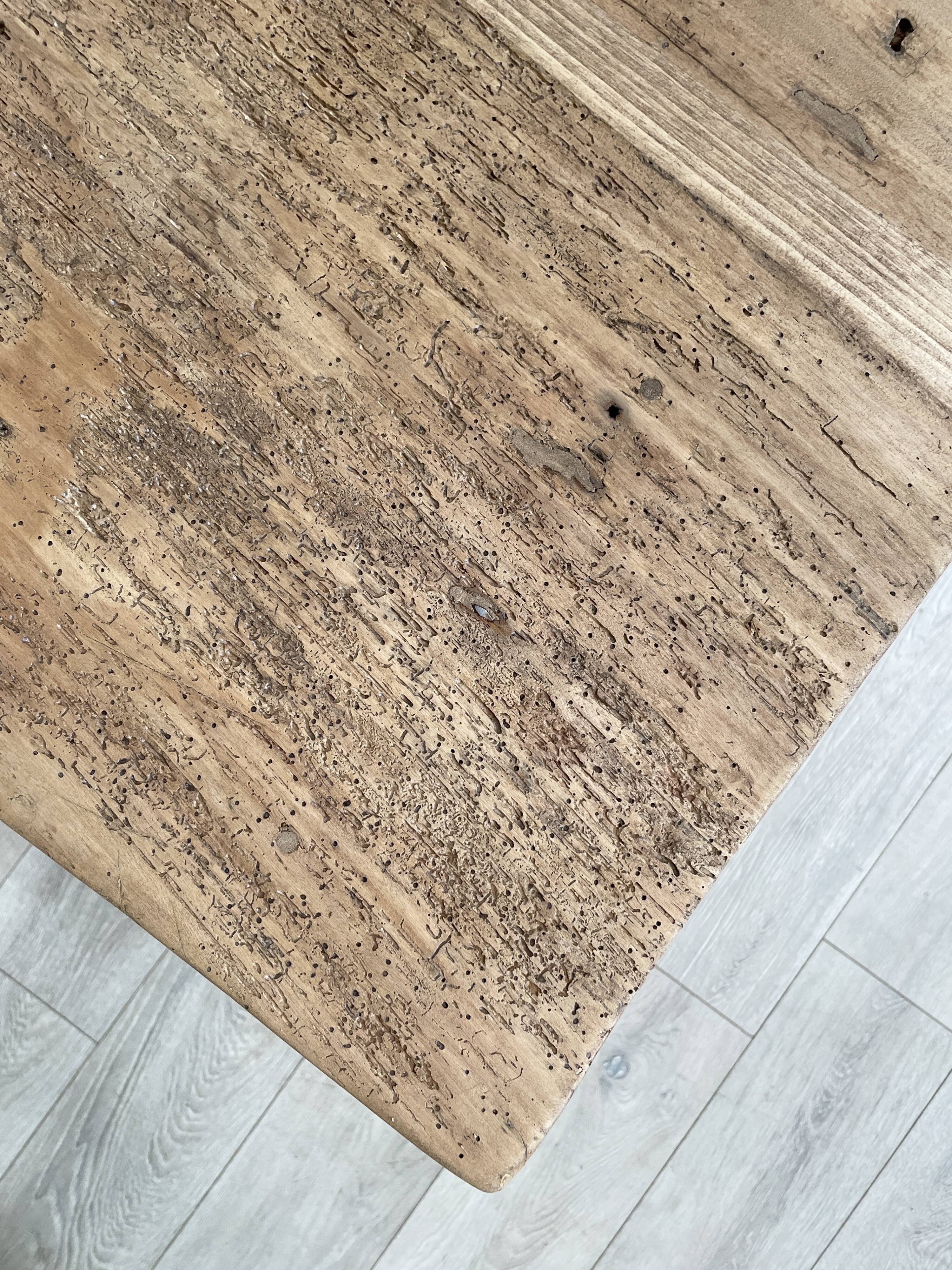 Vintage farm table with spindle legs.