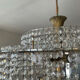 Vintage lucite chandelier with a cascade of crystal pendants from the 1970s.