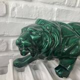 Sculpture of a lion on the lookout in St-Clément