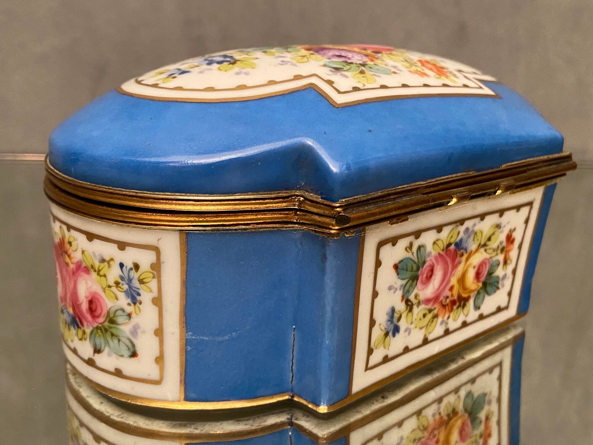 Domed porcelain box polychrome floral decoration on blue background brand Sèvres