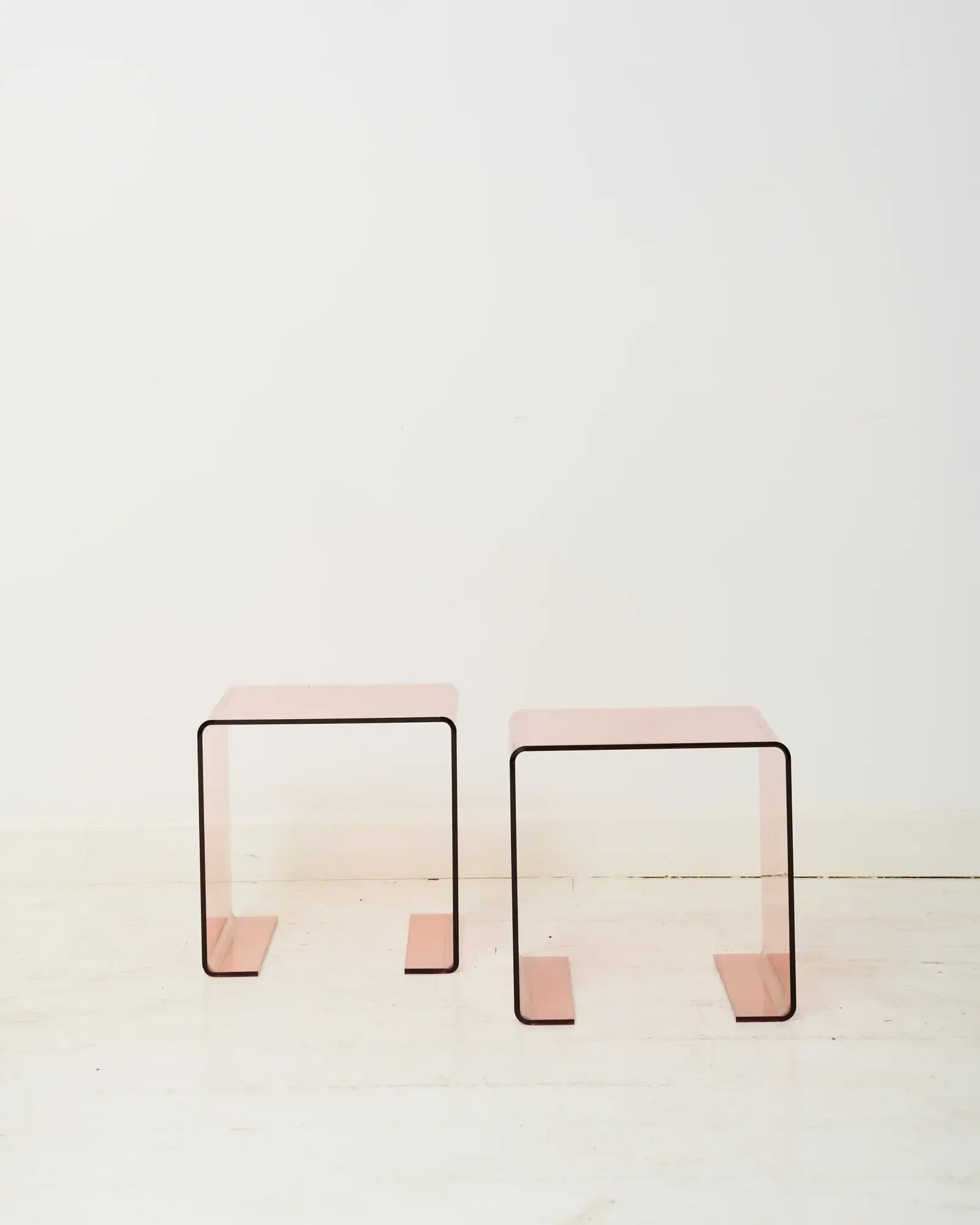 Pair of pink side tables, designed by Roche Bobois, 1970s.