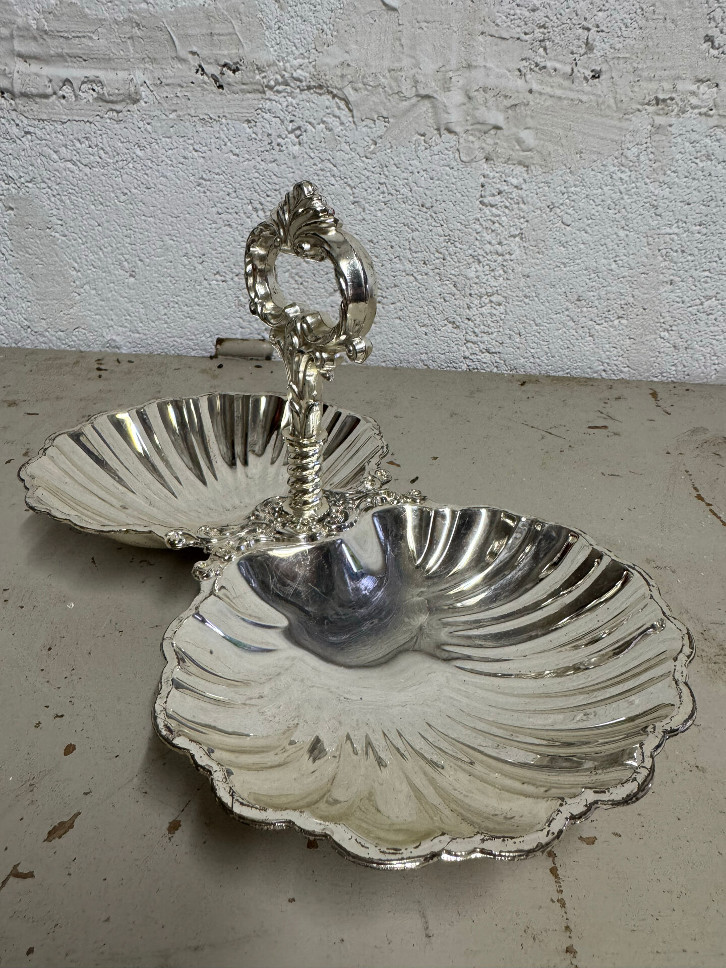 Vintage silver-plated shell display stand