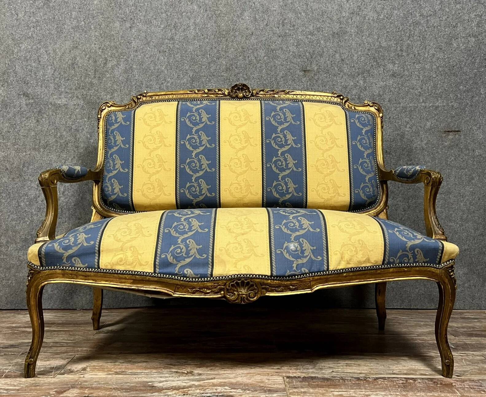 Louis XV style bench in gilded wood, 20th century