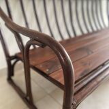 Vintage rattan bench from Maison Kok