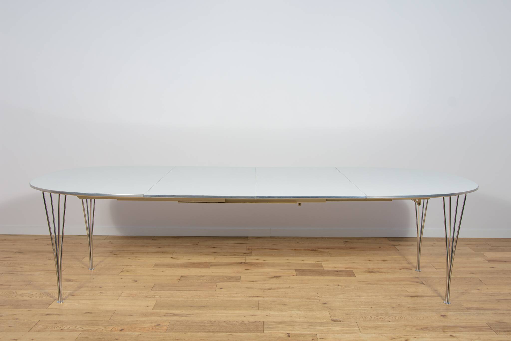 Mid Century Modern Extendable Ellipse B612 Dining Table by Piet Hein & Brun