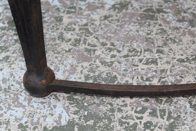 Black metal footing wooden coffee table