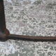 Black metal footing wooden coffee table