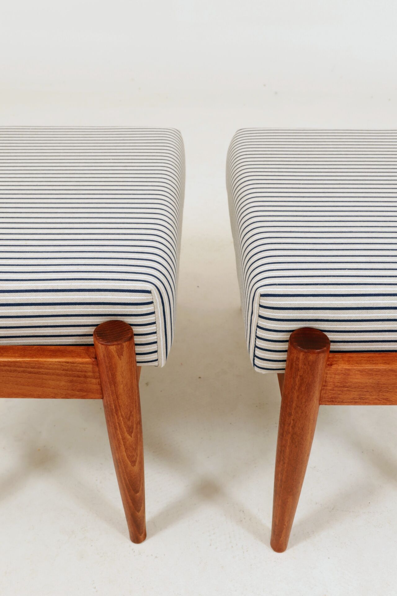 Armchair with striped fabric footrest, 1960