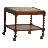 Modern Danish service table with turned spool legs and coloured tiles, 1950s.