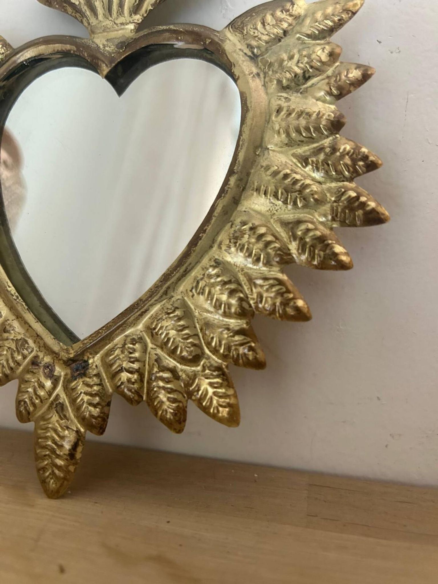Golden ex-voto wall heart