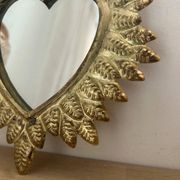 Golden ex-voto wall heart