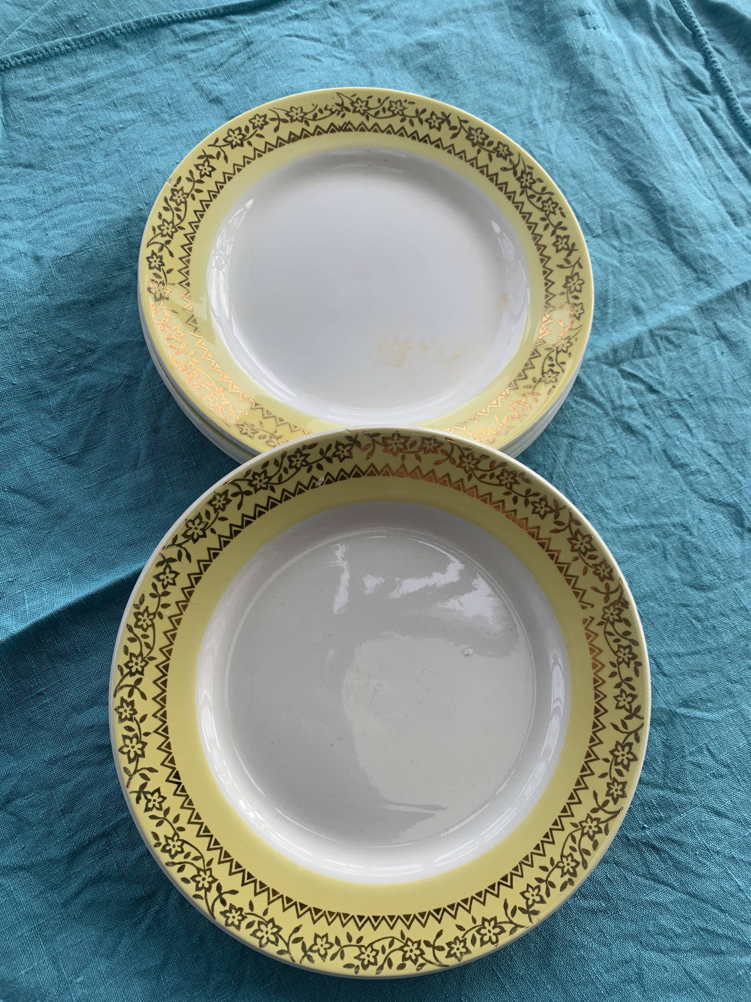 6 small plates with yellow borders and floral pattern gold antiques
