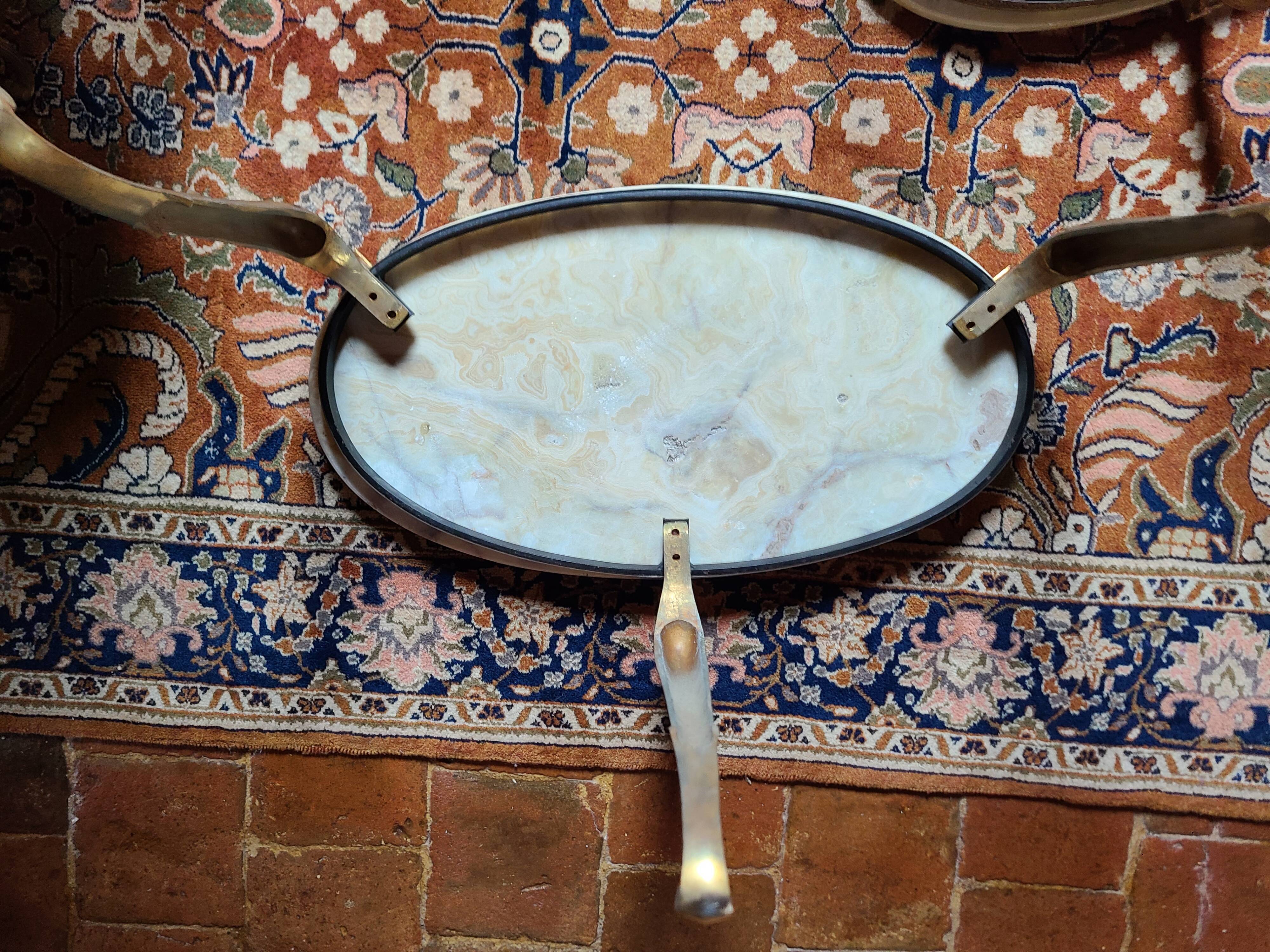 Marble nesting table with brass legs