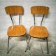 Pair of chairs in brown Formica