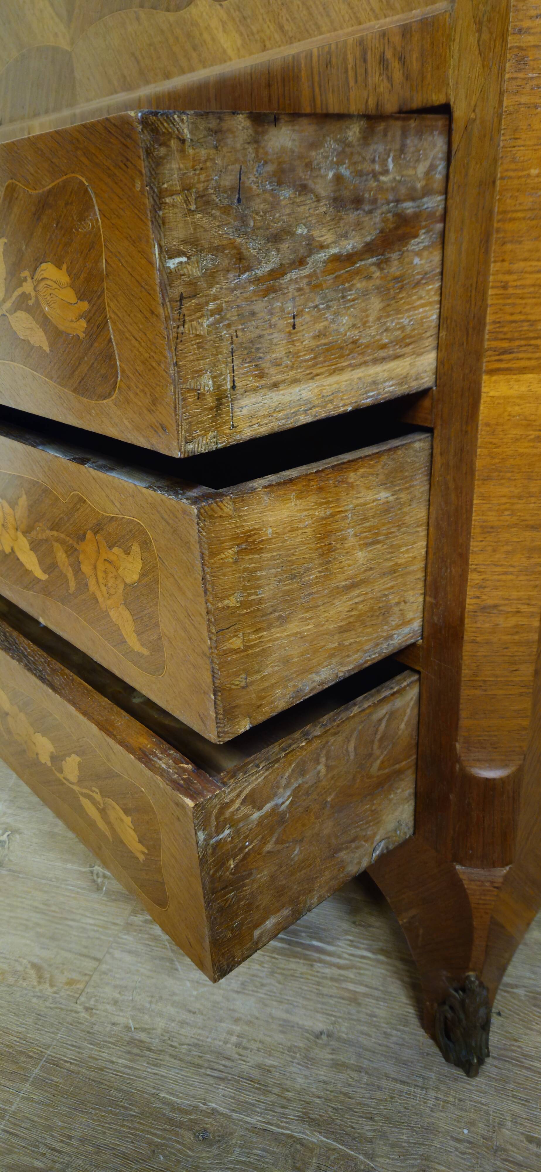 Secretary with a curved drop-leaf in floral marquetry, mid-19th century.