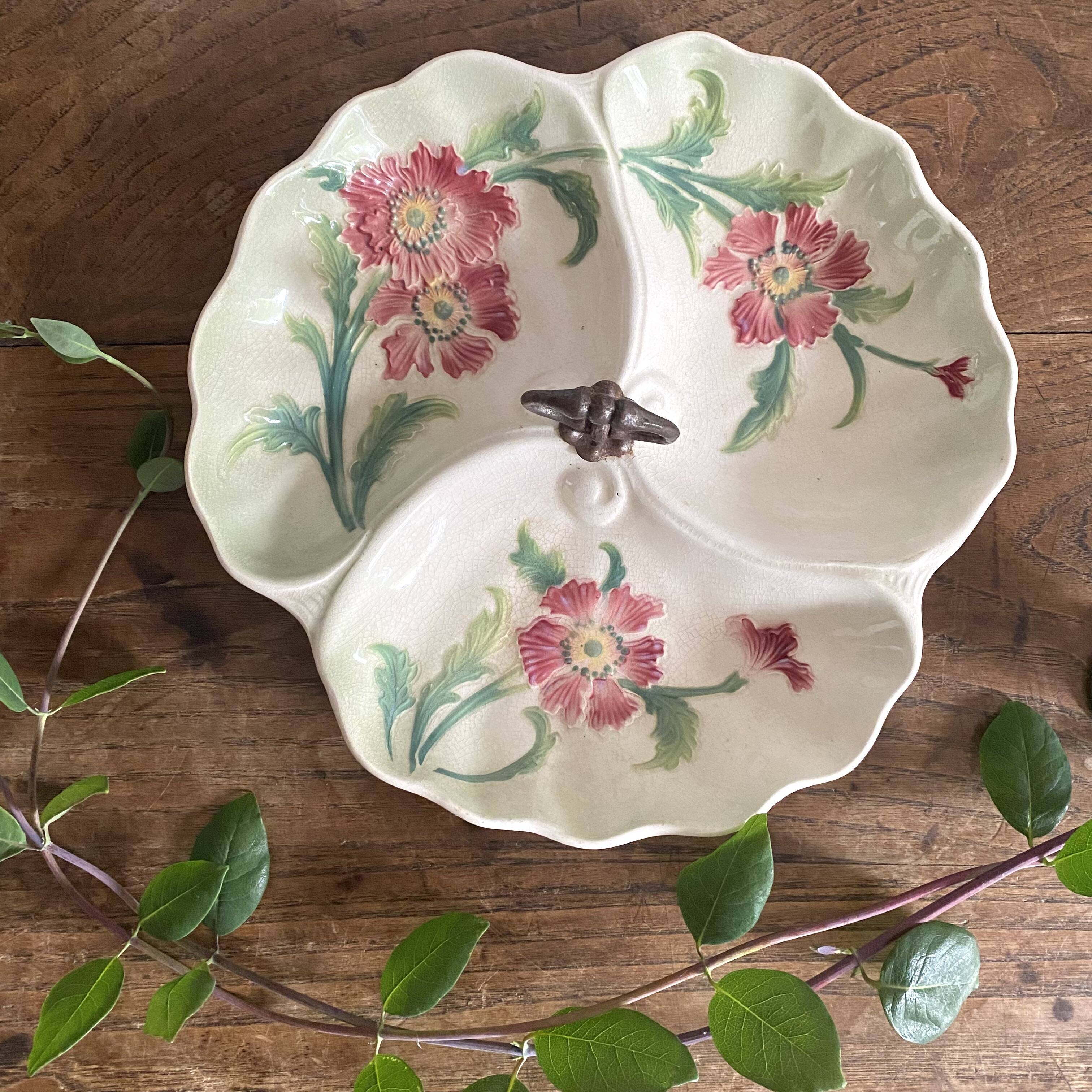 Art Nouveau slip dish with poppy decoration