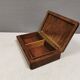 Wooden trinket box for storing jewellery, cigarettes or similar items.