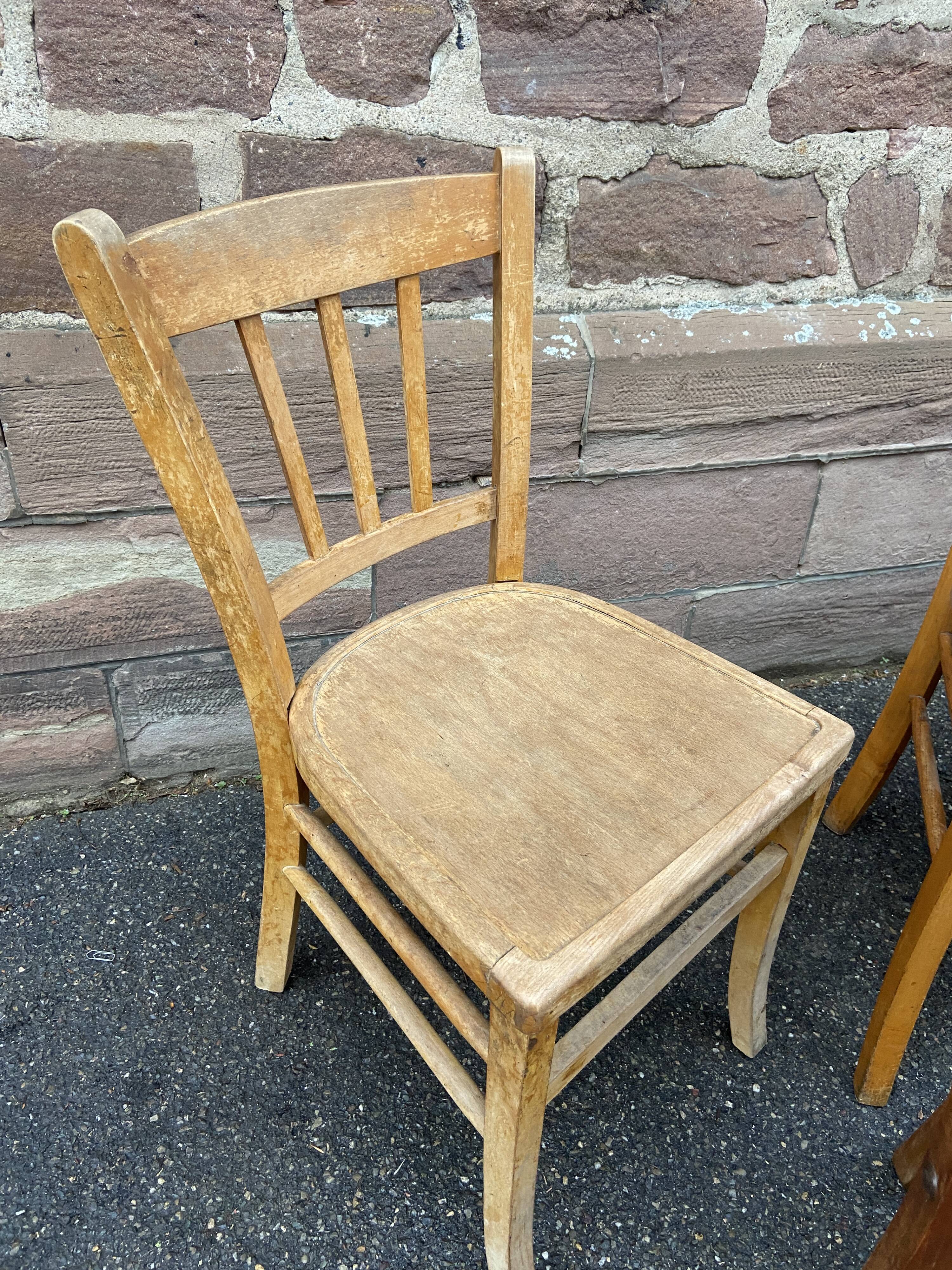 Set of vintage mismatched bistro chairs