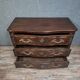 Louis XV/XVIII period Lyonnaise commode in moulded and carved walnut.