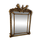 Miroir a parecloses de style Louis XVI en bois et stuc doré XIX siècle