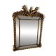 Louis XVI style mirror with parecloses in wood and gilded stucco, 19th century