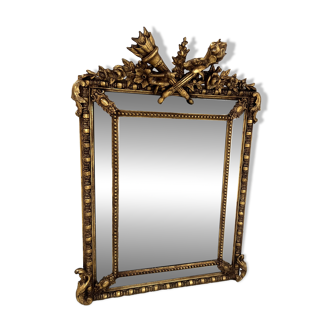 Louis XVI style mirror with parecloses in wood and gilded stucco, 19th century