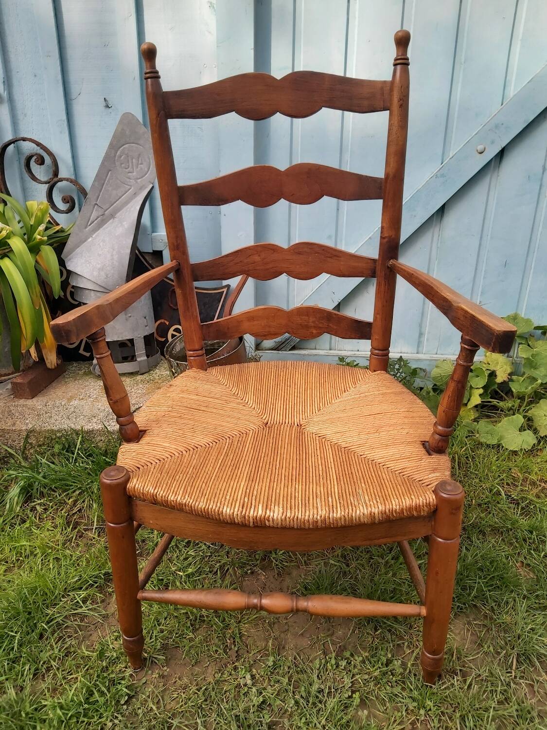 Wooden and straw armchair