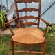 Wooden and straw armchair