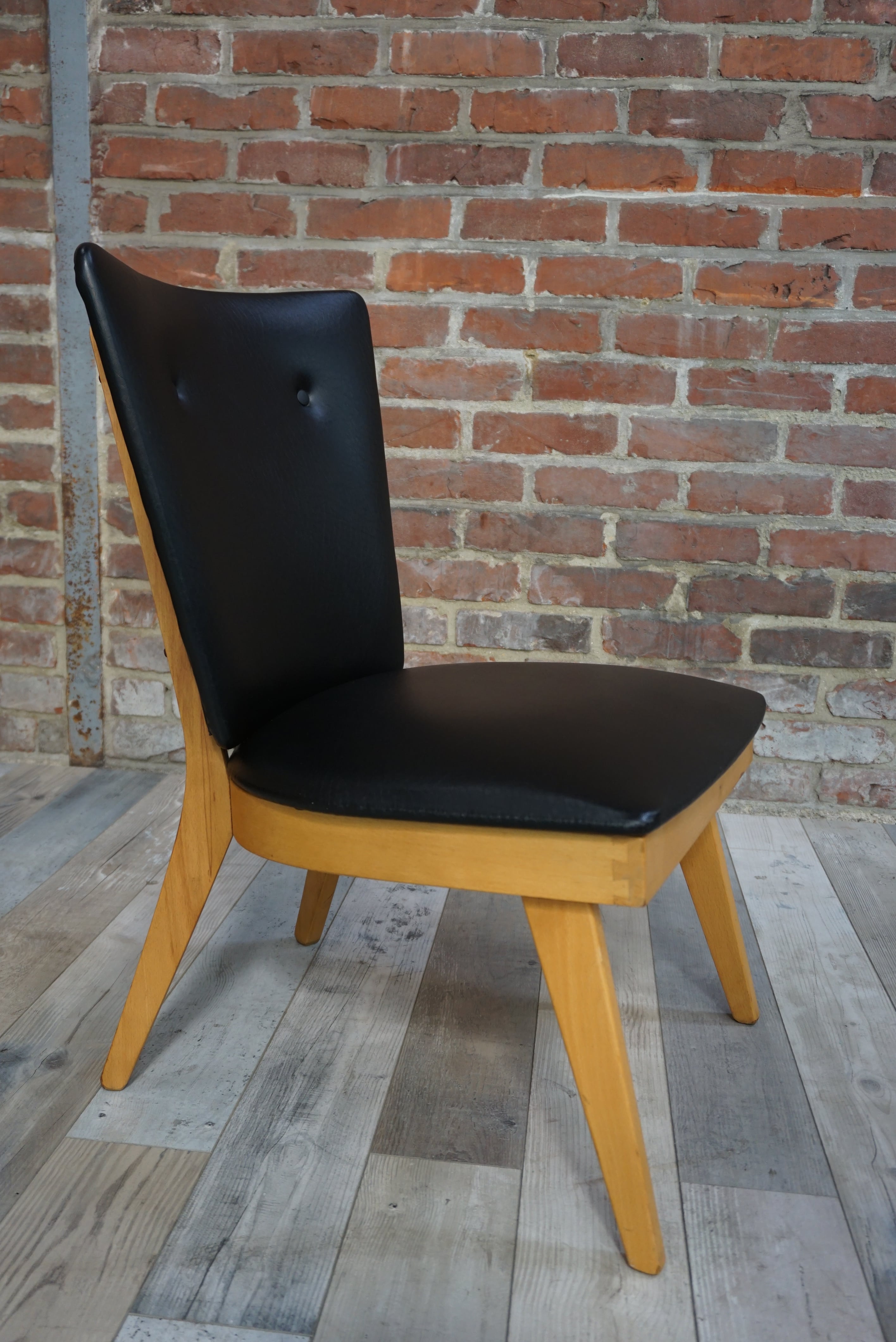 Chair 50 years in wood and faux black leather cocktail