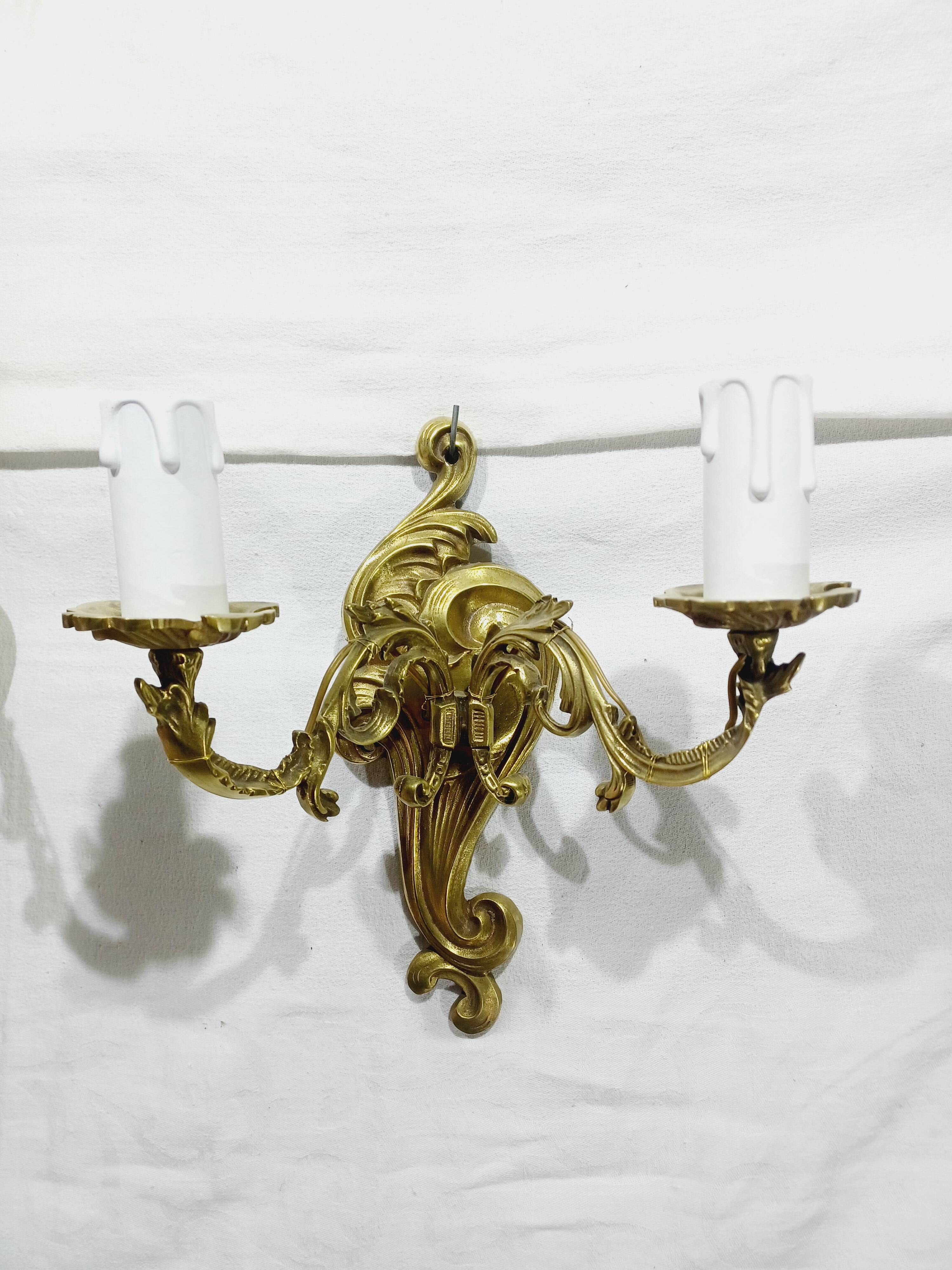 Pair of 2-light bronze wall lights, St. Louis XV