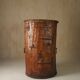 Primitive folk art cabinet made of an old tree trunk.