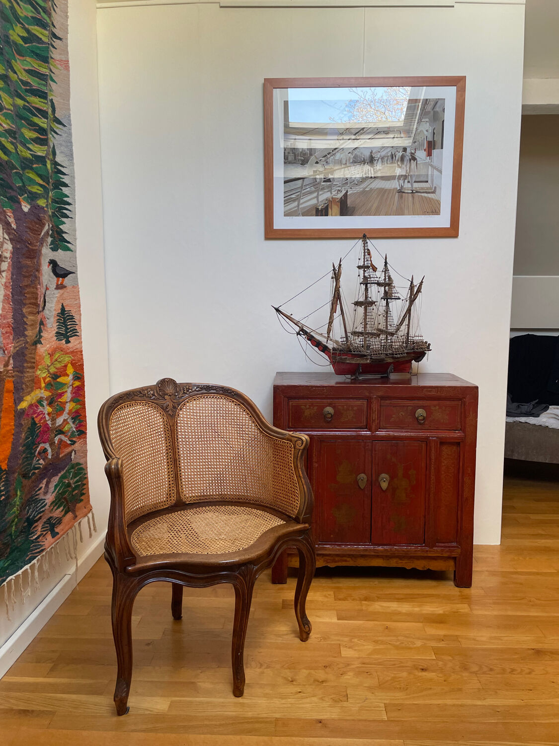Cane seat armchair from the 19th century in the Louis XV style, known as "couillard".