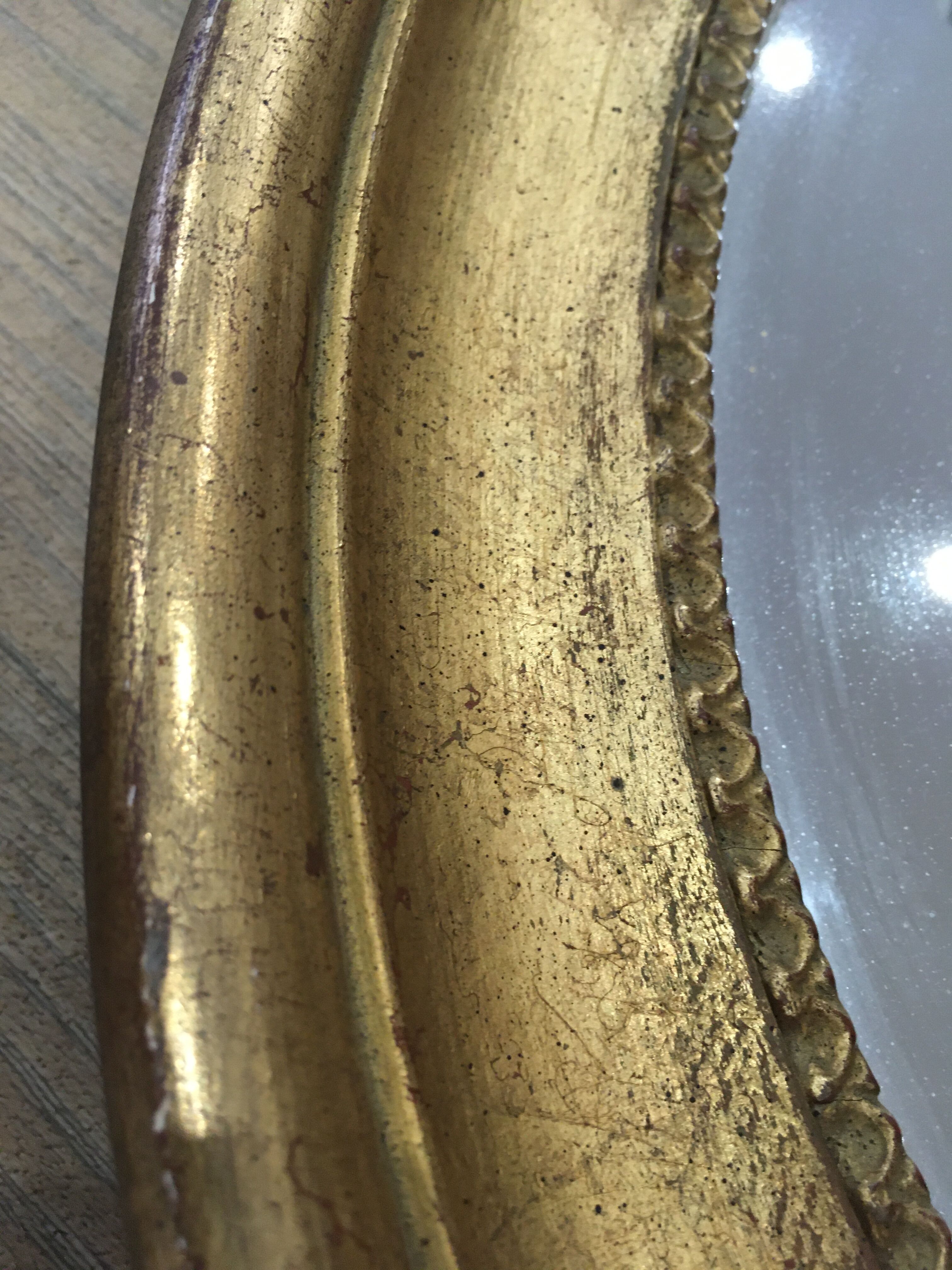 Old mirror gilded wooden frame.