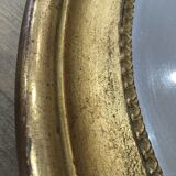 Old mirror gilded wooden frame.