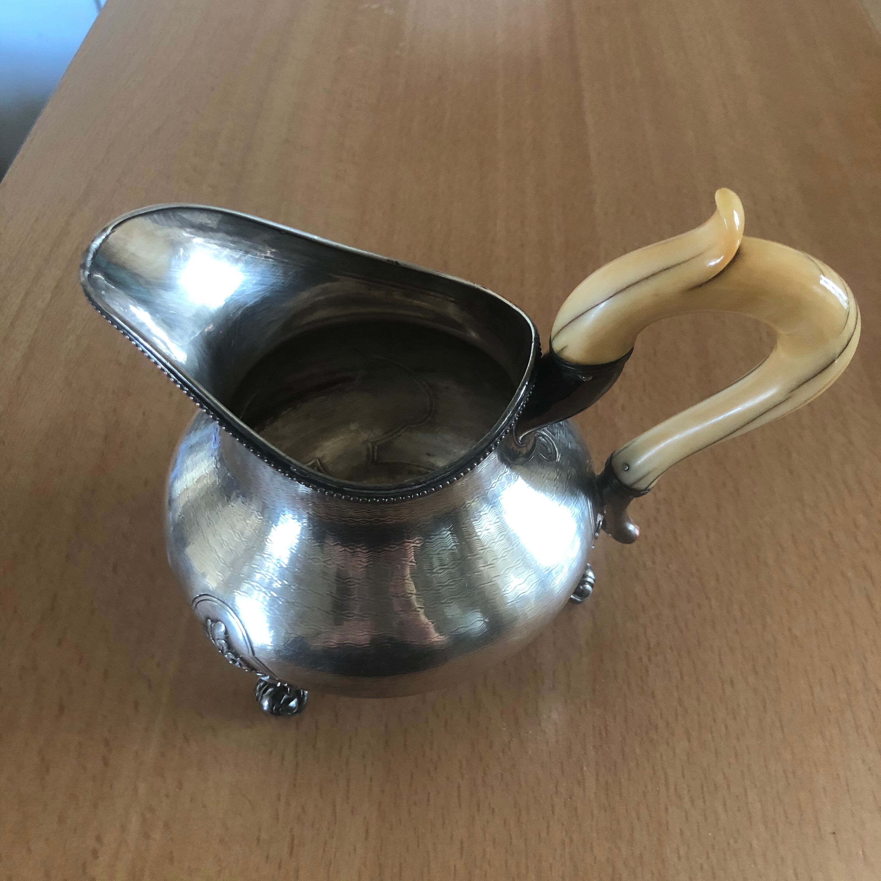 Silver metal milk pot