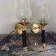 Pair of brass and black torchiere wall lights
