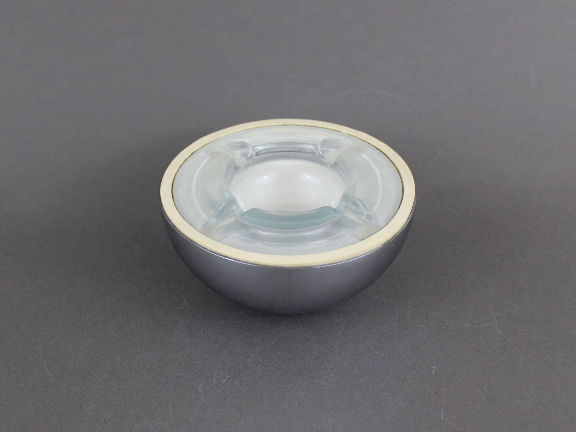 Puzzle ball ashtray design in vintage metal from the 70s
