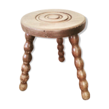Turned wooden milking stool