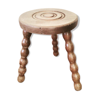 Turned wooden milking stool