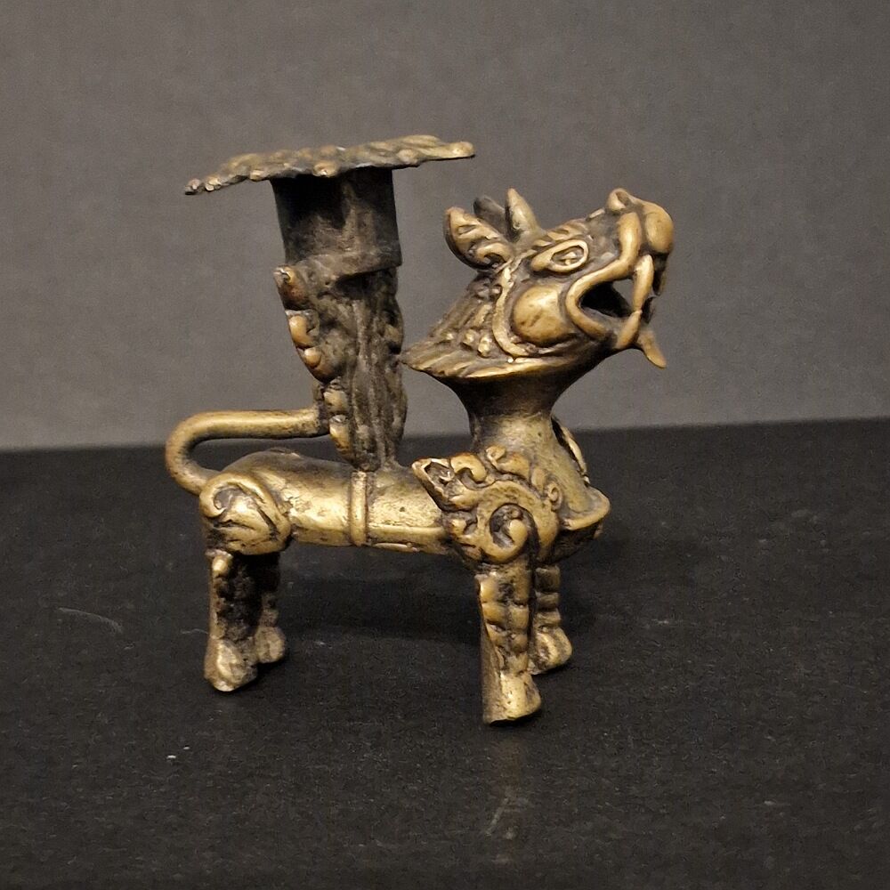 Old pair of candlesticks dog fô bronze