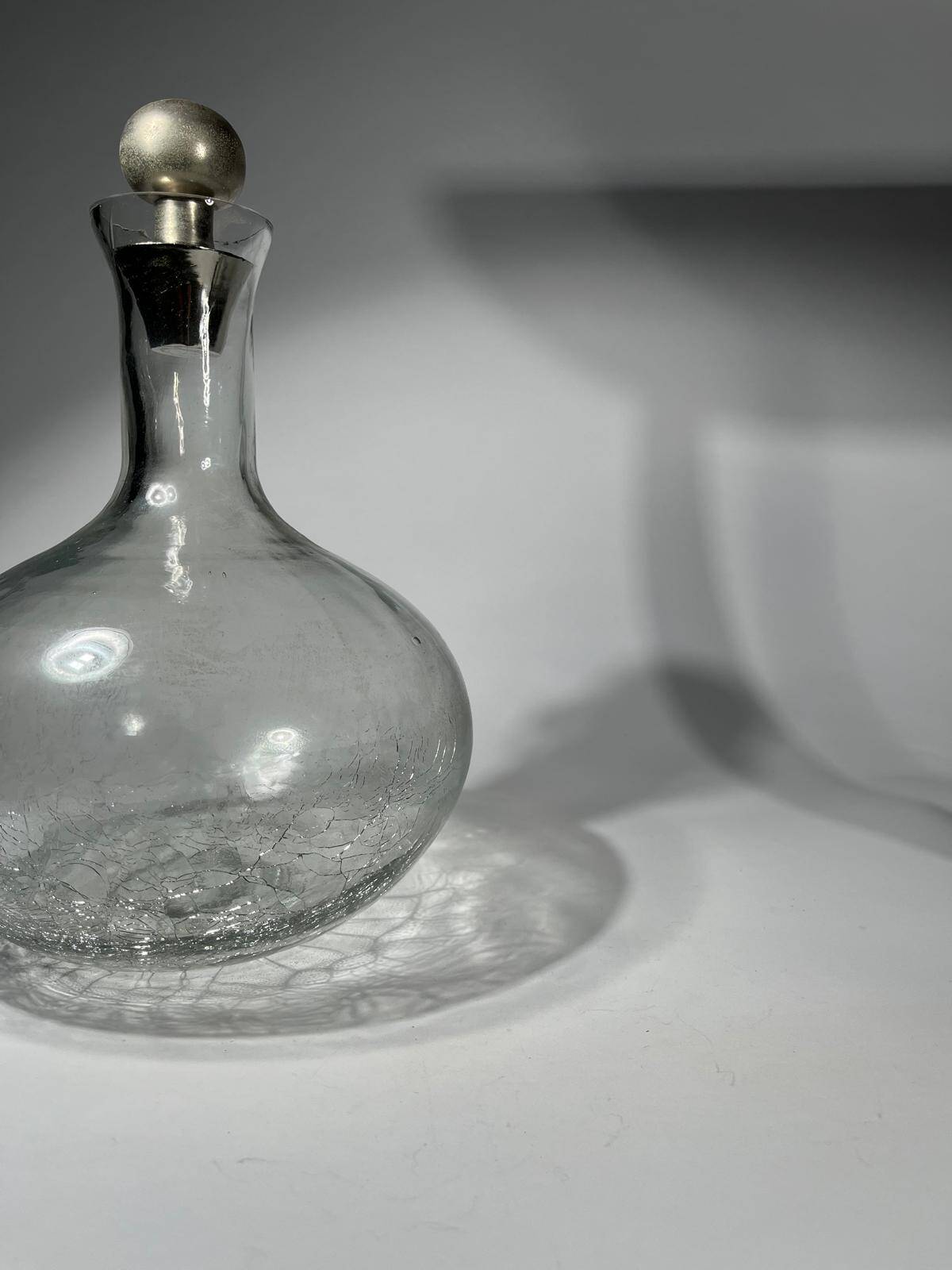 vintage cracked glass carafe with metal stopper