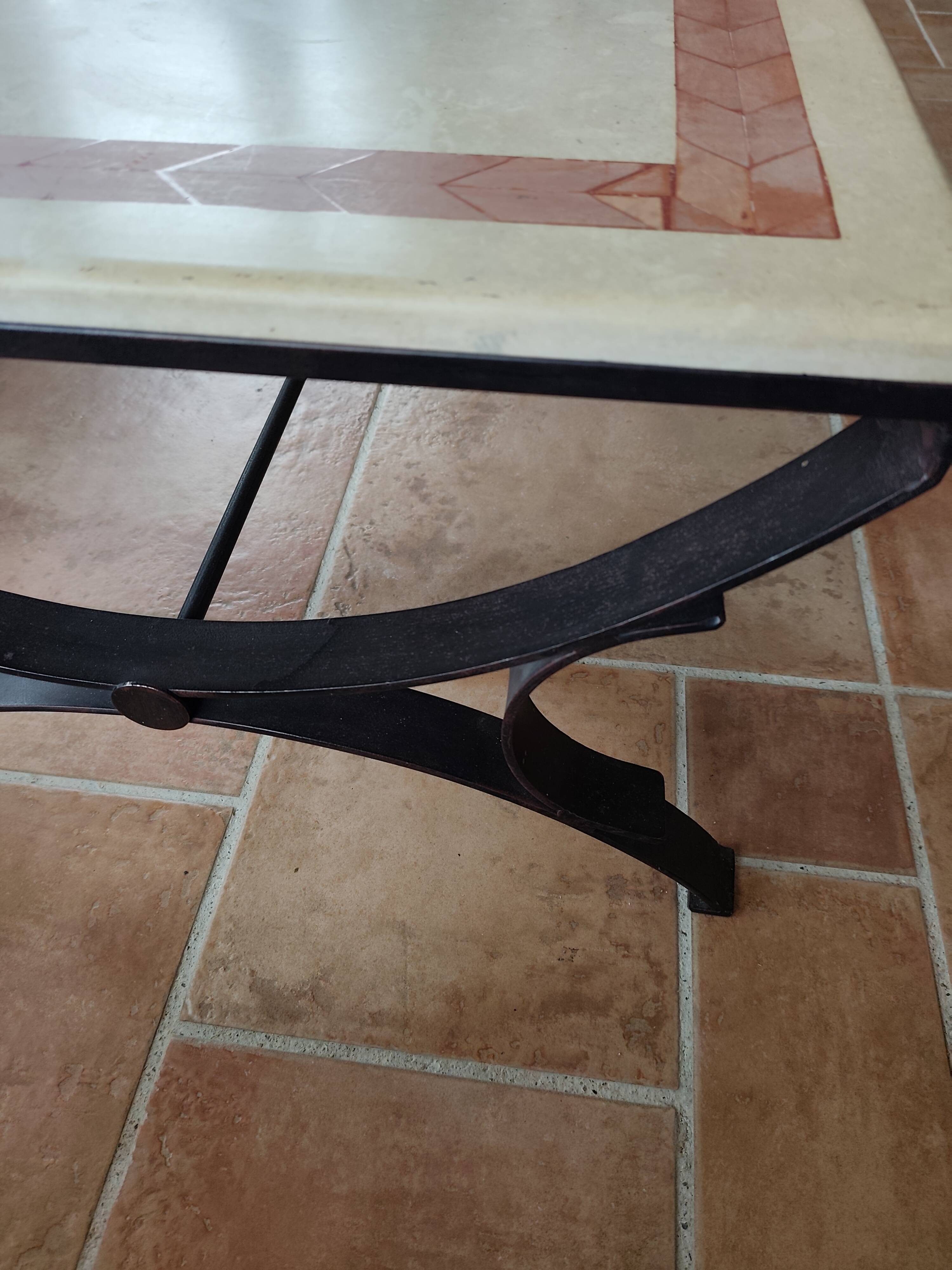 Character coffee table in stone marquetry and black metal.