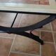 Character coffee table in stone marquetry and black metal.