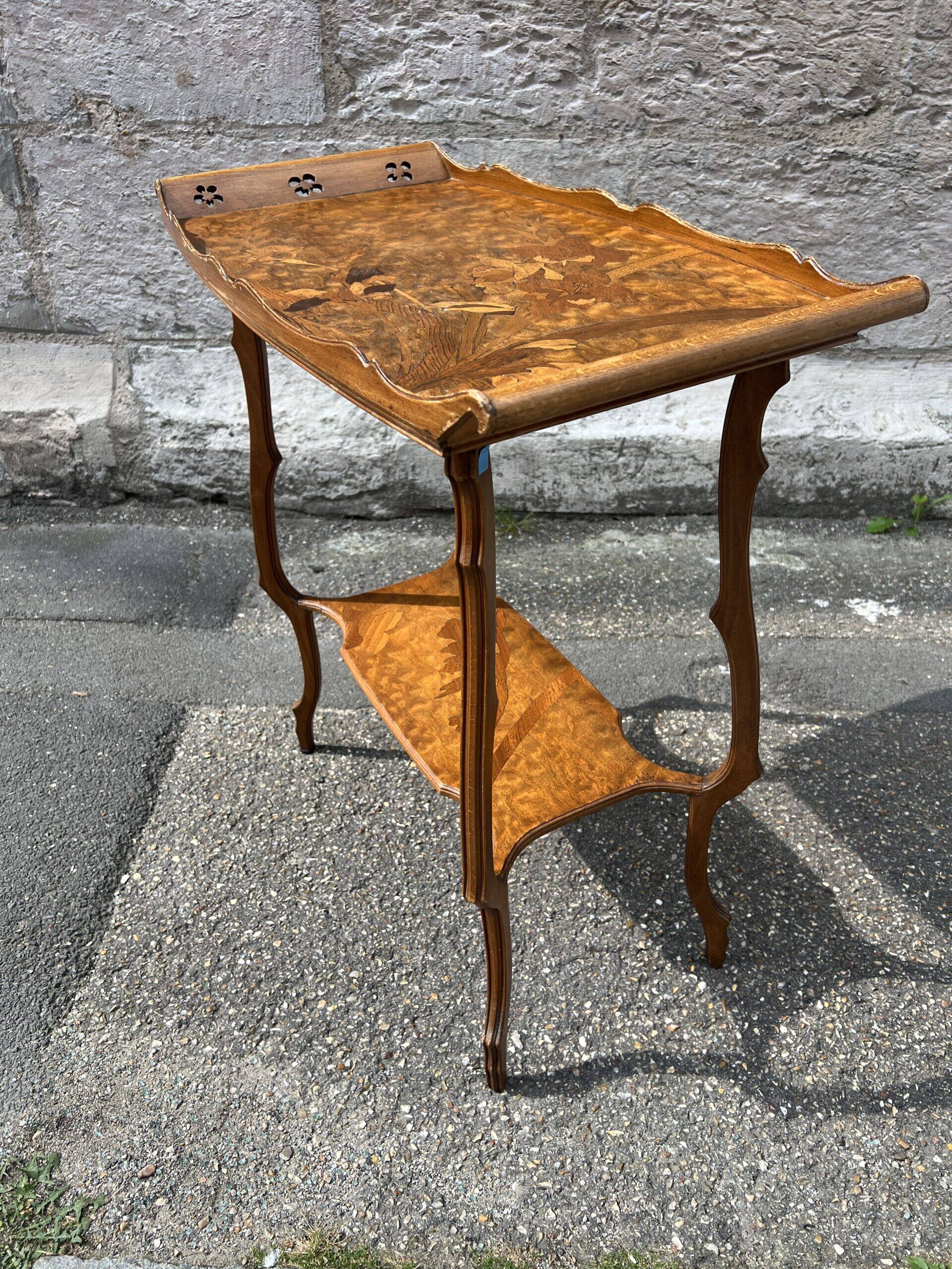 Art Nouveau period two-tiered tea table in veneered wood, signed Émile Gallé