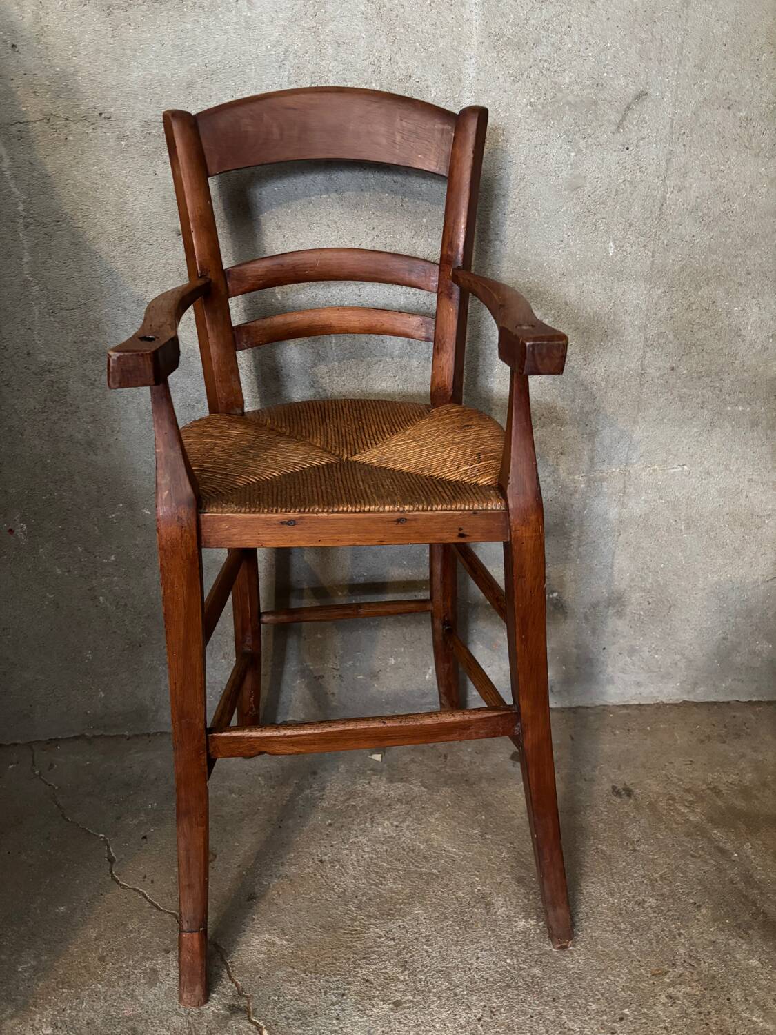 Old straw baby high chair