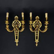 Large pair of gilt bronze wall sconces in the Louis XVI style.