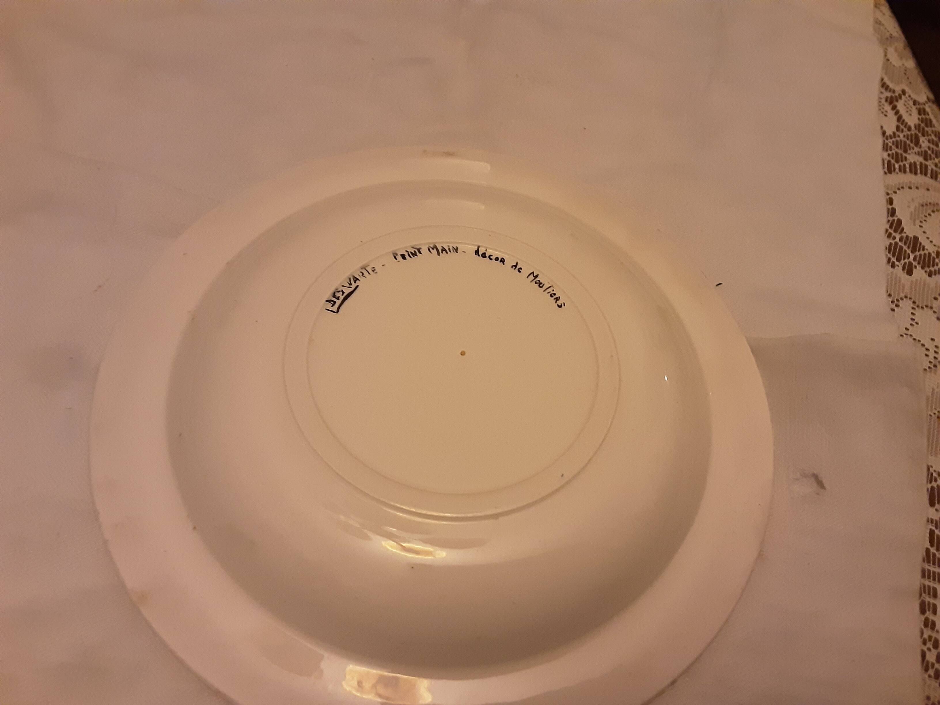 Deswarce hand-painted earthenware plate with moustier decor