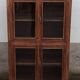 Old wooden glazed cabinet with four doors