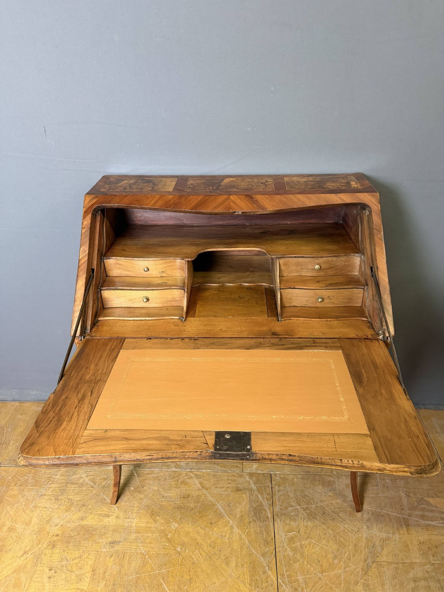 Louis XV slant-top desk in 18th-century marquetry.