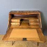 Louis XV slant-top desk in 18th-century marquetry.